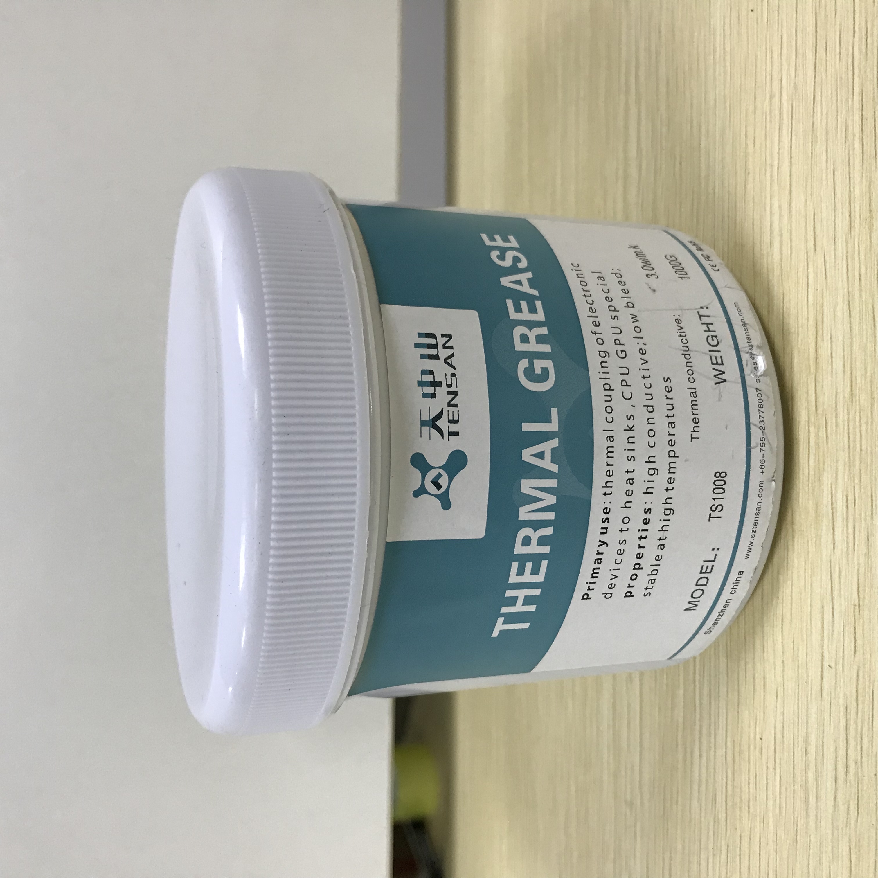 How do I apply thermally conductive silicone grease?